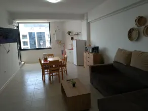 2 Appartments , next to each other, on the beach, splendid view, max 12 persons - Salle de séjour