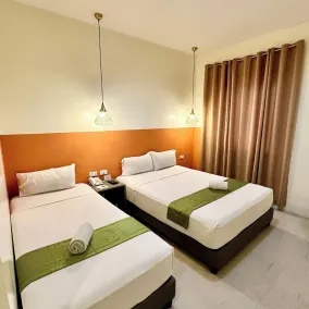 Travelbee Capitol Inn - Zimmer