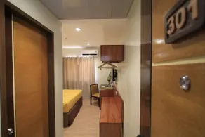 Coron Soleil Express Hotel - Chambre