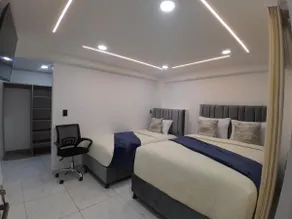 Hotel West Inn - Zimmer
