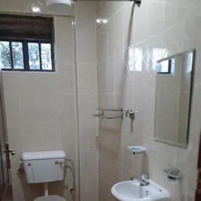 Unico Resort Mbale - Badezimmer