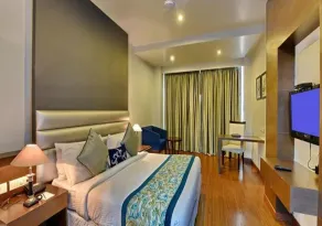 M B Greens Clarks Inn - Chambre