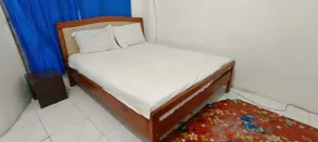 Hotel O Wisma Parakita Syariah Near RS Faisal Patalasang - Habitación