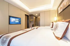 Huabao sports exhibition hotel - Quarto