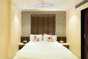 Hotel Sangat Regency - Chambre
