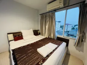 INN Kham Apartment - Quarto