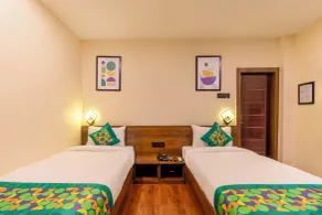 Treebo Green Pearl Inn - Chambre
