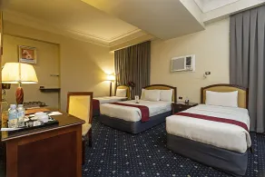 Sarrosa International Hotel and Residential Suites - Chambre