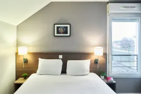 Zenitude Hôtel Résidences Roissy Village - Chambre