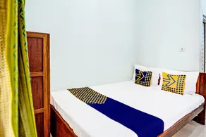 Capital O 94012 Dewa Jati House - Room