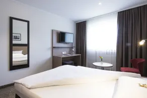 Astor & Aparthotel - Chambre