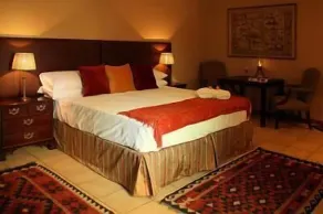 Edelweiss Corporate Guest House - Zimmer
