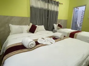 Hotel Kavya Inn - Habitación