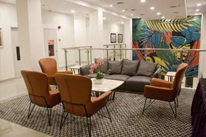 Hotel Scholar's Suites - Siddeområde i lobbyen