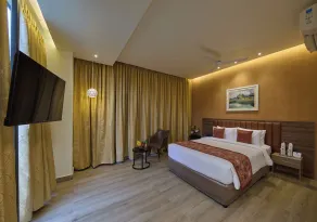 Grand Continent Mysore A Sarovar Portico Affiliate Hotel - Chambre
