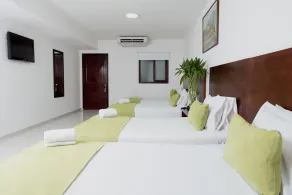 TAMA Hotel Granada Real Cali - Habitación