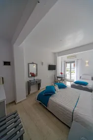 Blue Waves Suites & Apartments - Chambre