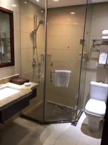 Yiyang Huatian Hotel - Badezimmer