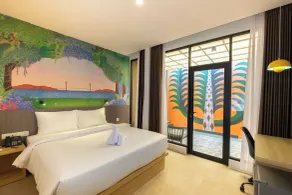 Ayola Signature Ocarina Batam - Chambre