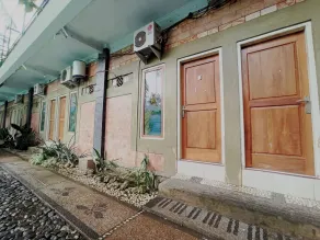 Penginapan Asri Syariah - Detalle del exterior
