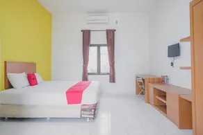 RedDoorz Syariah @ Pasir Putih Jambi - Chambre
