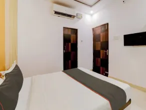 Collection O Kiara Guest House - Quarto