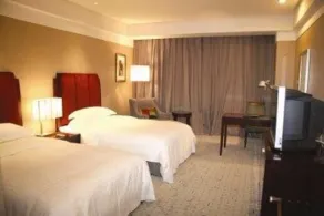Grand New Century Hotel Binhai Tianjin - Room