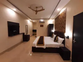 THE PALMS RESORT - Zimmer
