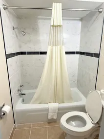 Economy Inn - Badezimmer