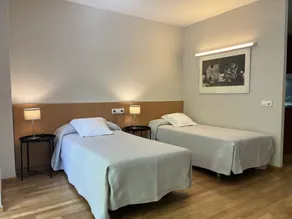 Apartamentos León - Camera