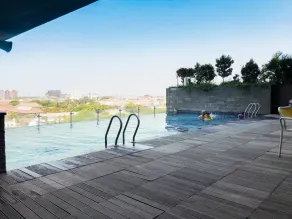 Minimalist 2BR Apartment at Tamansari Papilio By Travelio - Pool