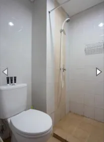 Apartemen Taman Melati Margonda by Winroom - Badezimmer