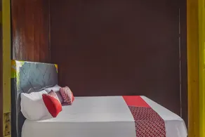 Hotel O Filadelfia Resto & Penginapan Near Benteng Moraya - Habitación
