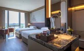 Jianguo Hotel HUANQIU - Værelse