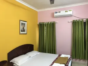Indraprastham Tourist Home - Værelse