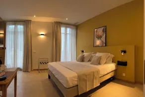Le Palmier - ÉTABLISSEMENT PARA-HÔTELIER AVEC GARAGE PRIVÉ ET SÉCURISÉ AU PIED DES REMPARTS - Zimmer