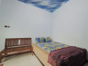 Penginapan Asri Syariah - Habitación