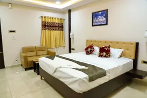 Gokulam Grand - Chambre