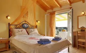 «Captain Spiros Studios» avec vue sur la mer, balcon, climatisation et Wi-Fi - Chambre