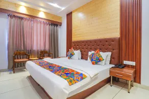 FabHotel Grand Arya - Zimmer