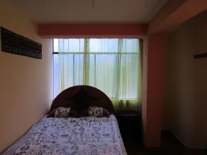 Hostal Ayllu con cochera - Room
