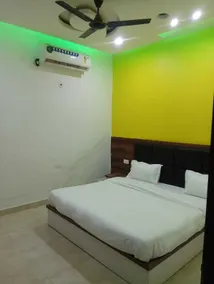 Treebo Chanakya Palm - Chambre