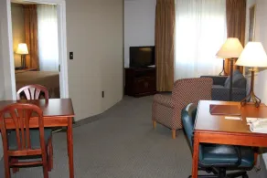 Host Inn an All Suites Hotel - Chambre