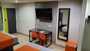 Exclusivo Inn and Suites - Chambre