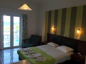 Amoudi Studios Apartments Hotel - Chambre