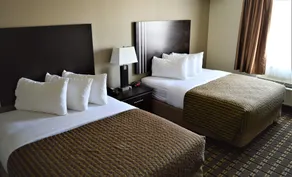 Sigma Inn & Suites - Chambre