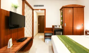 Treebo Premium Akshaya Mahal Inn - Room