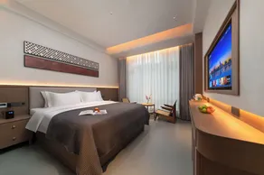 Zhangjiajie 101 Courtyard offers free coffee,complimentary shuttle service to the East Gate of the Forest Park for guests staying two nights, free self-service laundry and drying facilities, and paid pick-up and drop-off services from the high - Værelse