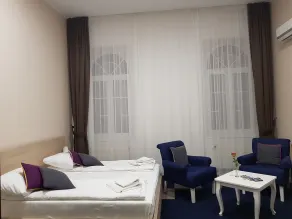 Hotel Story - Habitación