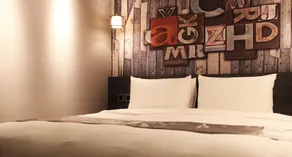 Sunrise Hotel - Værelse